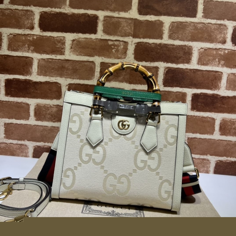 G*u*i top handle bags